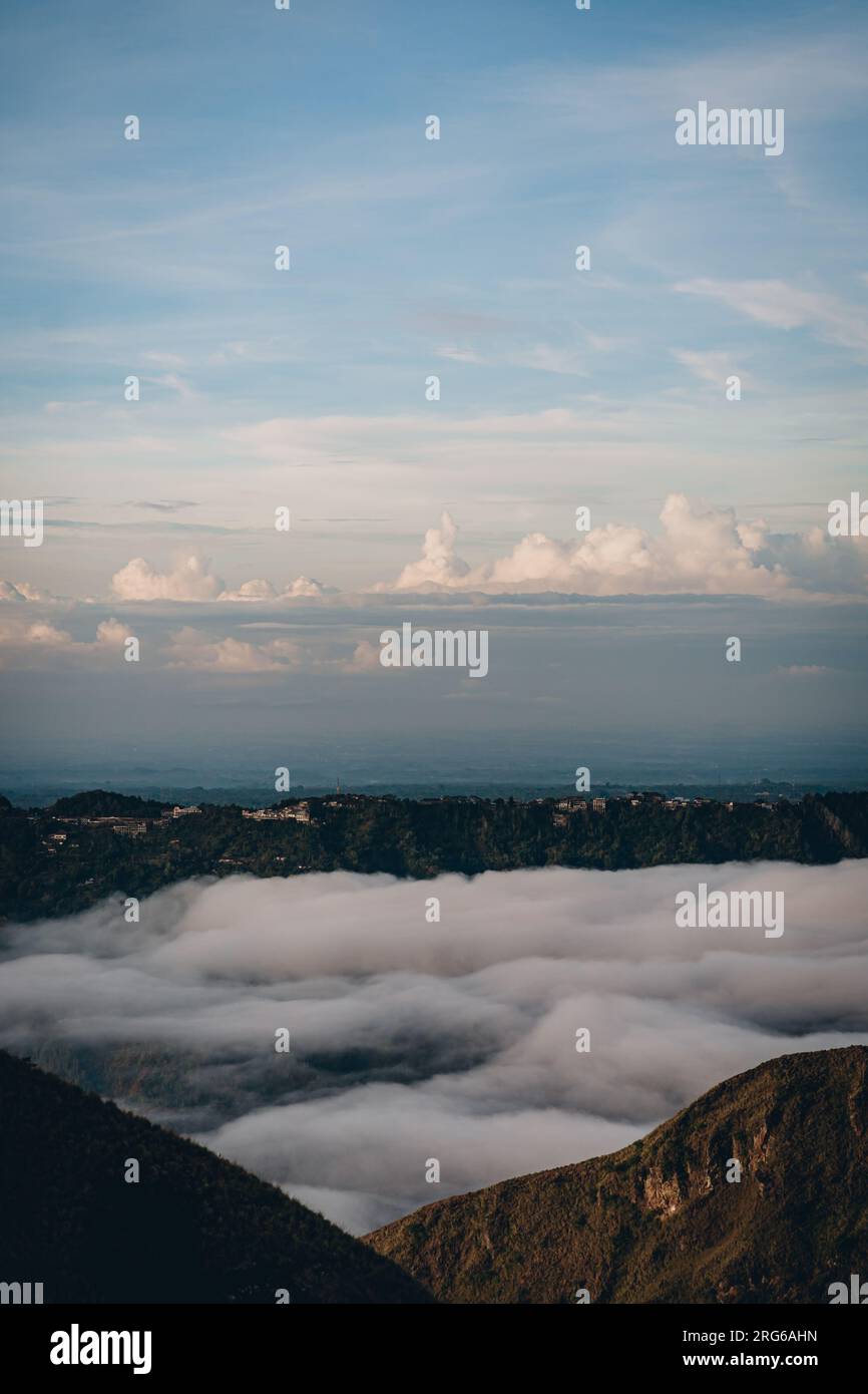 Landscape view of morning clouds and mist at mountain Batur. Sunrise ...