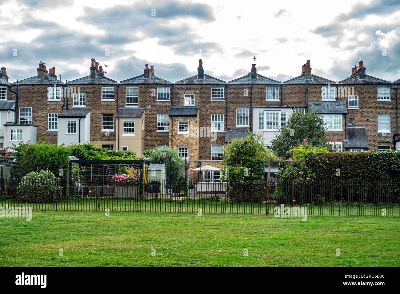 Town houses seen from the rear backing onto The Long Walk at Windsor in Berkshire, UK Stock Photo