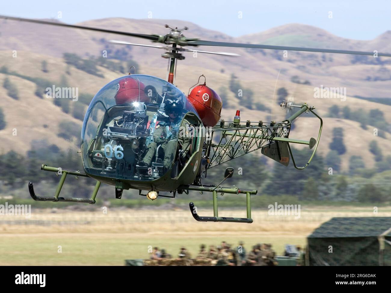 A Bell 47G helicopter of the Royal New Zealand Air Force in flight, New