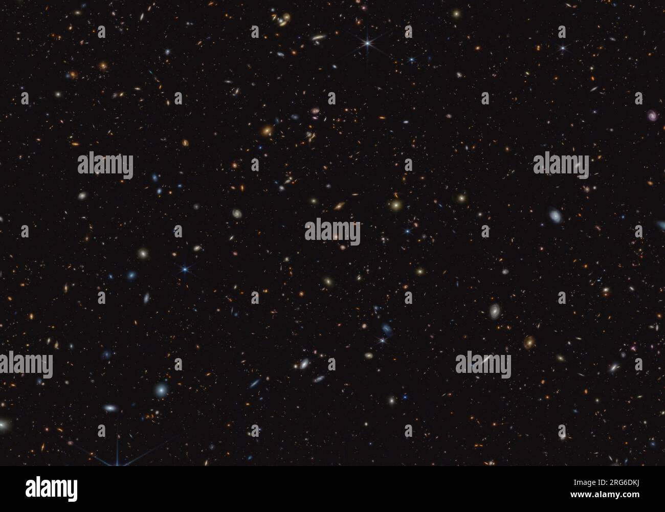 A portion of an area of the sky known as GOODS-South, with more than 45,000 galaxies visible. Stock Photo