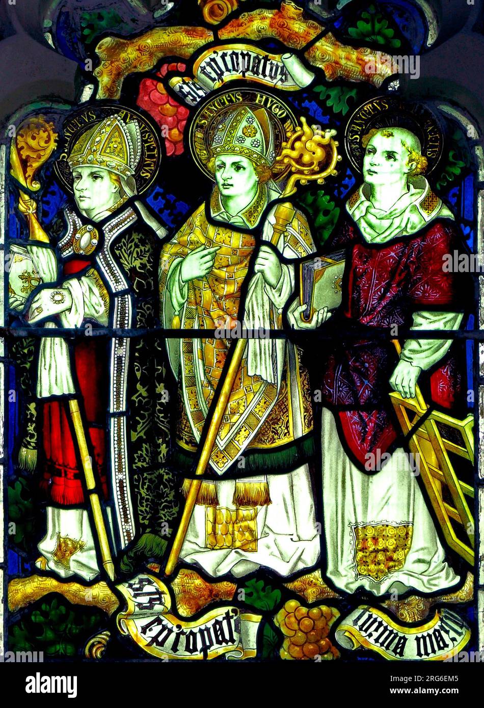 St. Augustine, St. Hugo, St. Laurentius or St. Lawrence, martyr, stained glass window by Charles Kempe, 1879, Stanhoe church, Norfolk, England Stock Photo