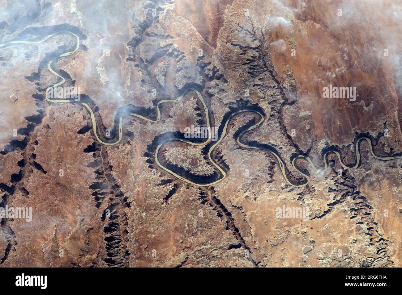 A portion of the Green River and its tributary canyons in the state of Utah, as seen from space. Stock Photo