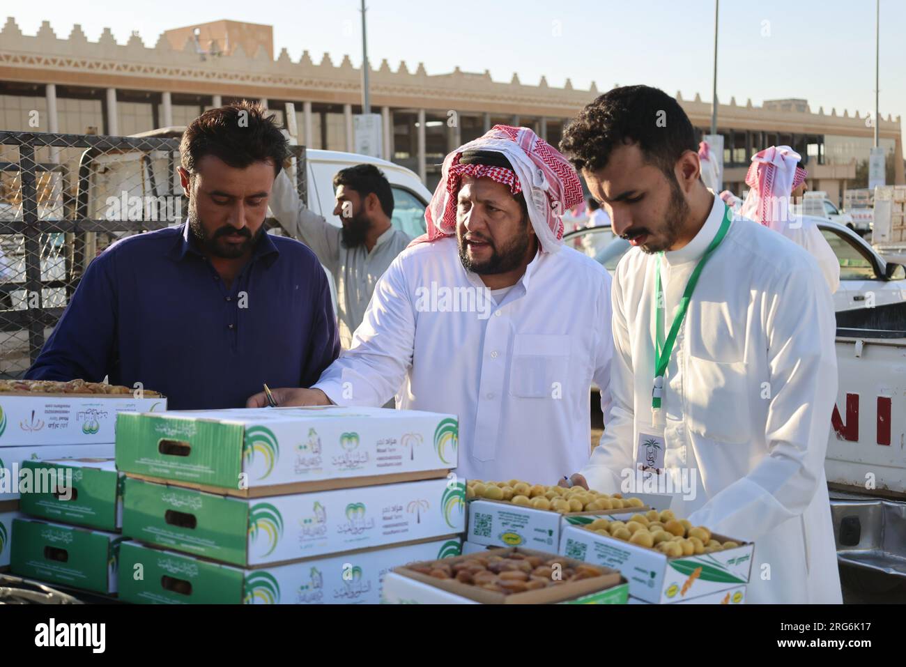 Qassim, Saudi Arabia. 7th Aug, 2023. People sell boxes of dates at the