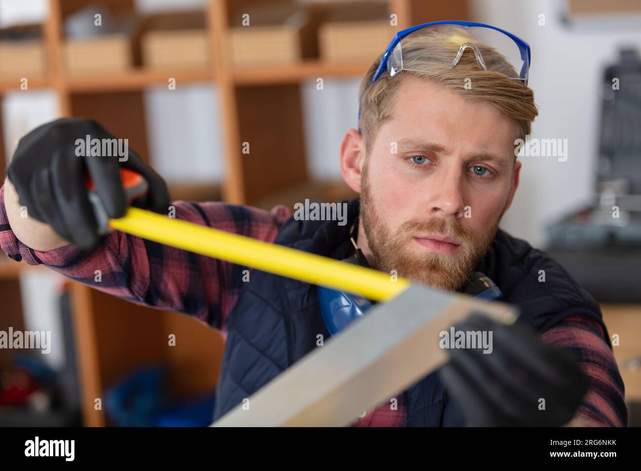 male carpenter at interior wood door installation Stock Photo Alamy