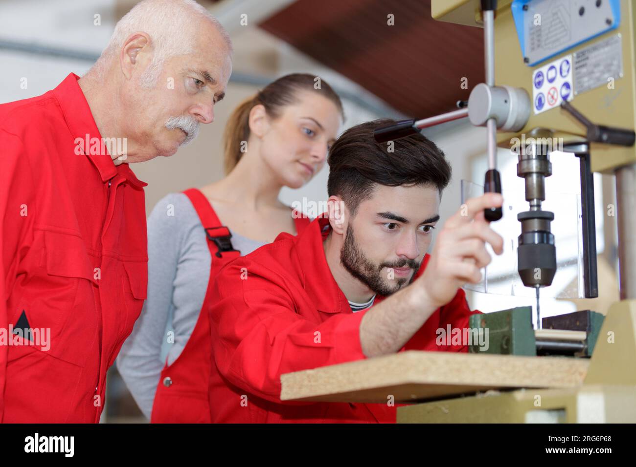 young man with using a milling machine in the workshop Stock Photo