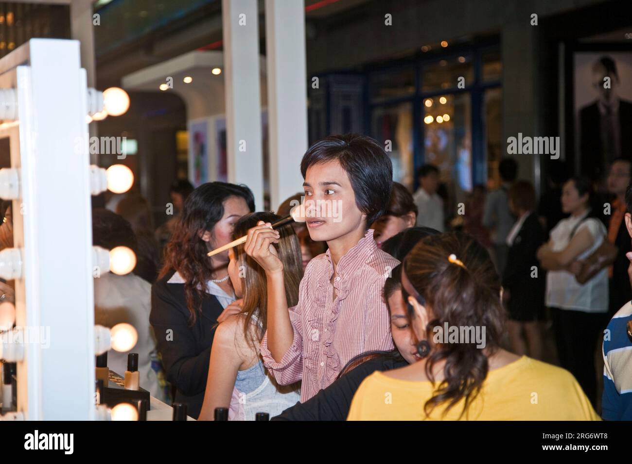 BANGKOK, THAILAND - May 11: the cosmetic company avery sponsores a makeup assistance course with its products in the central world shopping center and Stock Photo