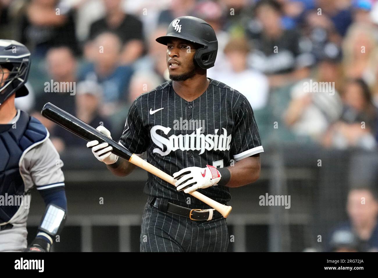 Chicago White Sox's Tim Anderson returns to the dugout after striking ...