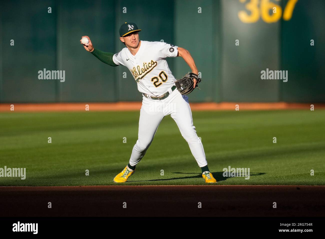 Oakland Athletics second baseman Zack Gelof throws out Texas Rangers