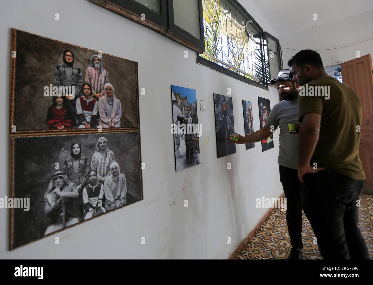 Gaza, Palestine. 25th June, 2023. Palestinians watch an art exhibition