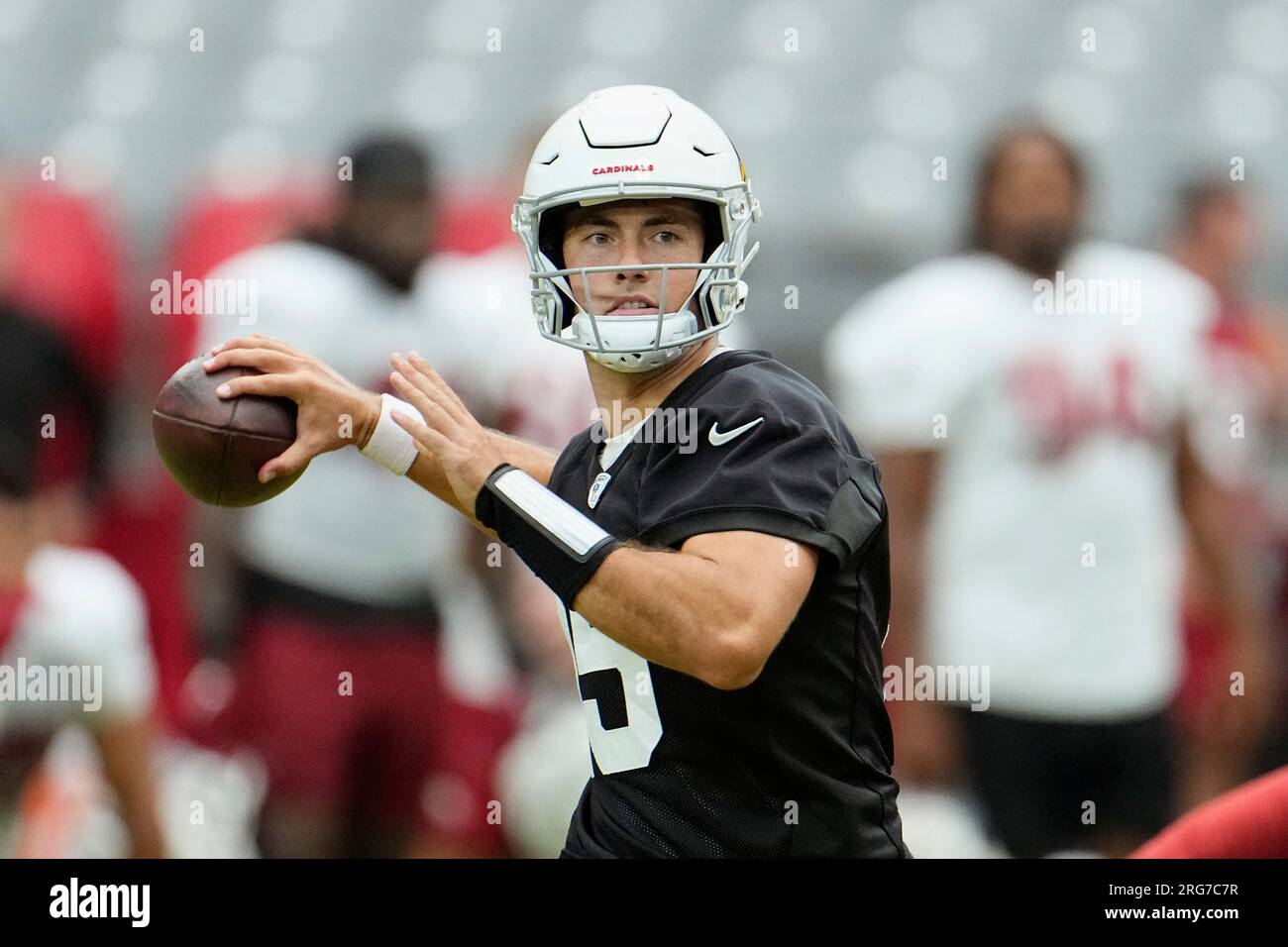 Arizona Cardinals quarterback Clayton Tune looks to throw the ball ...