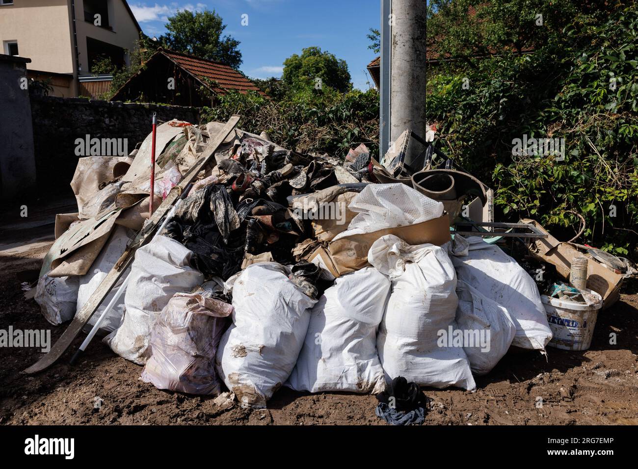 Skofja Loka, Slovenia. 07th Aug, 2023. Bags of destroyed personal belongings are seen on the street in Skofja Loka after country-wide flooding a couple of days ago. Clean-up and rescue efforts after major flooding in Slovenia are underway. The damage is enormous. (Photo by Luka Dakskobler/SOPA Images/Sipa USA) Credit: Sipa USA/Alamy Live News Stock Photo