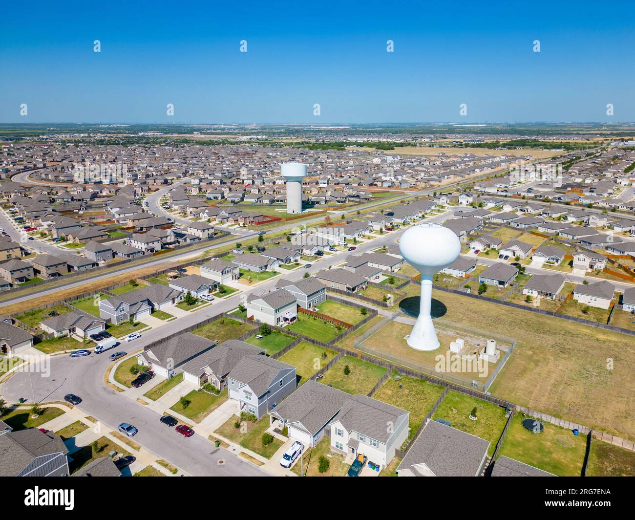 Aerial photo Manor Texas neighborhood homes with water tower community