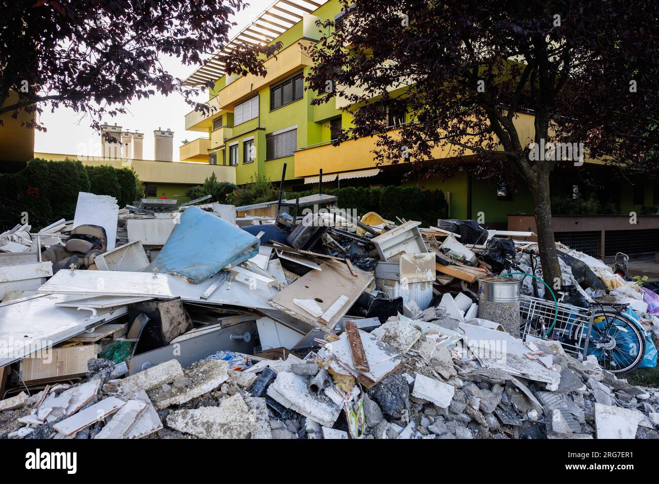 Moste, Slovenia. 07th Aug, 2023. Piles of debris and personal belongings are seen outside a residential building that was heavily damaged in the country-wide flooding a couple of days ago in Moste near Komenda. Clean-up and rescue efforts after major flooding in Slovenia are underway. The damage is enormous. (Photo by Luka Dakskobler/SOPA Images/Sipa USA) Credit: Sipa USA/Alamy Live News Stock Photo