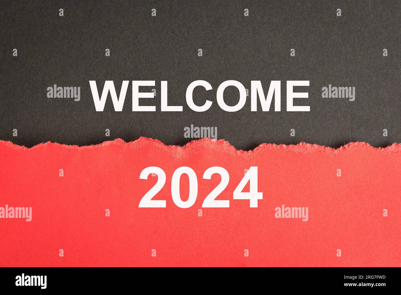 2024, word on black and red torn paper. New year concept Stock