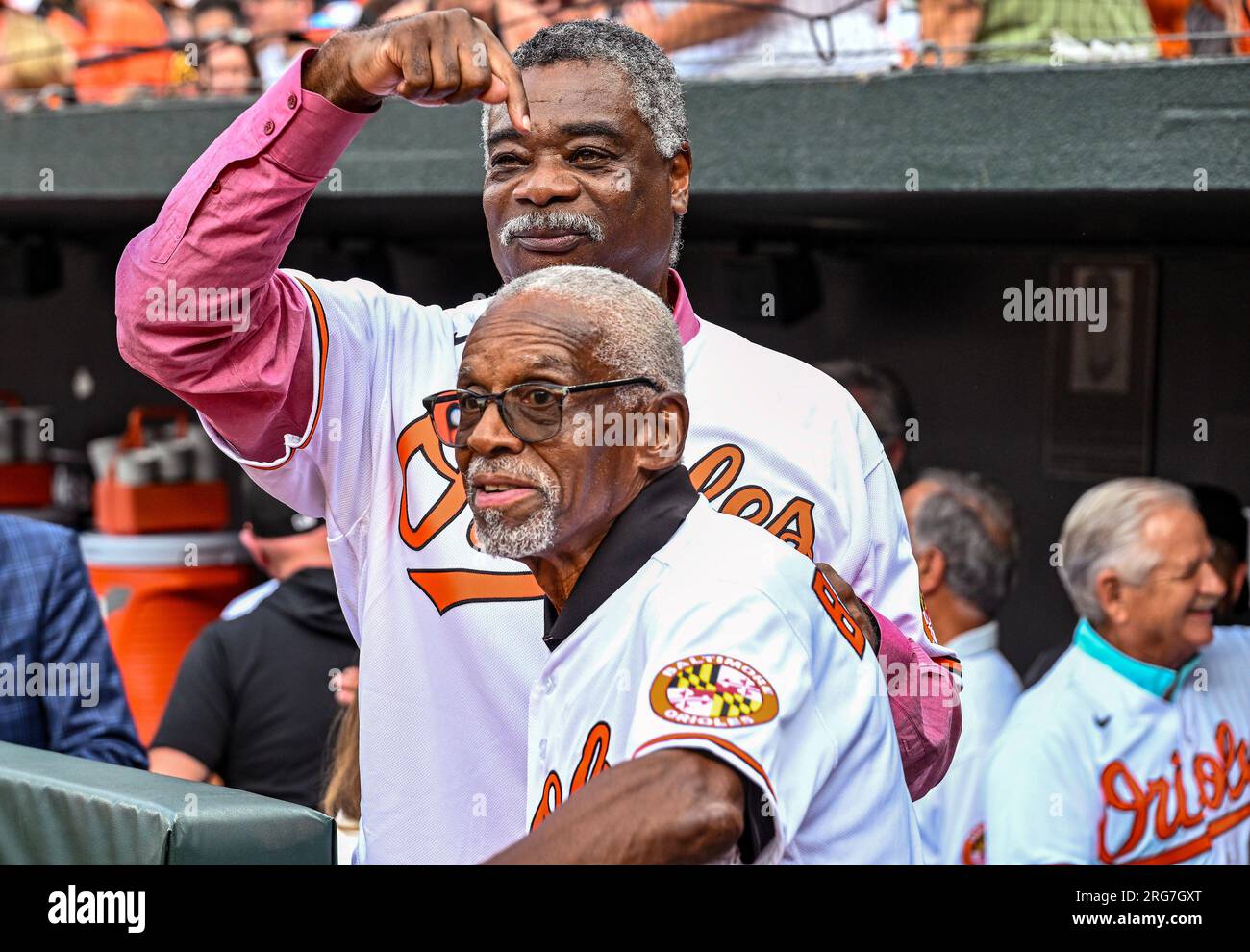 BALTIMORE, MD - August 5: Former Baltimore Orioles greats , Eddie Murray  (L) points to Al Bumbry (R) as they take the field for a ceremony to honor  the 1983 Orioles World