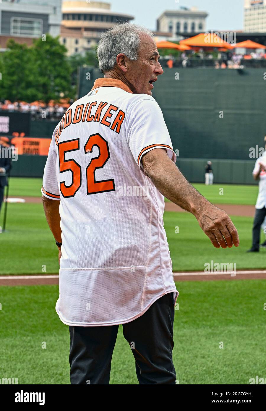BALTIMORE, MD - August 5: Former Baltimore Orioles pitcher Mike Boddicker  (52) takes the field for a ceremony to honor the 1983 Orioles World Series  winning team prior to the New York