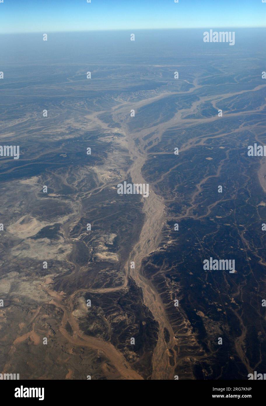 A Surreal aerial view of dried river beds in the desert in Jordan near