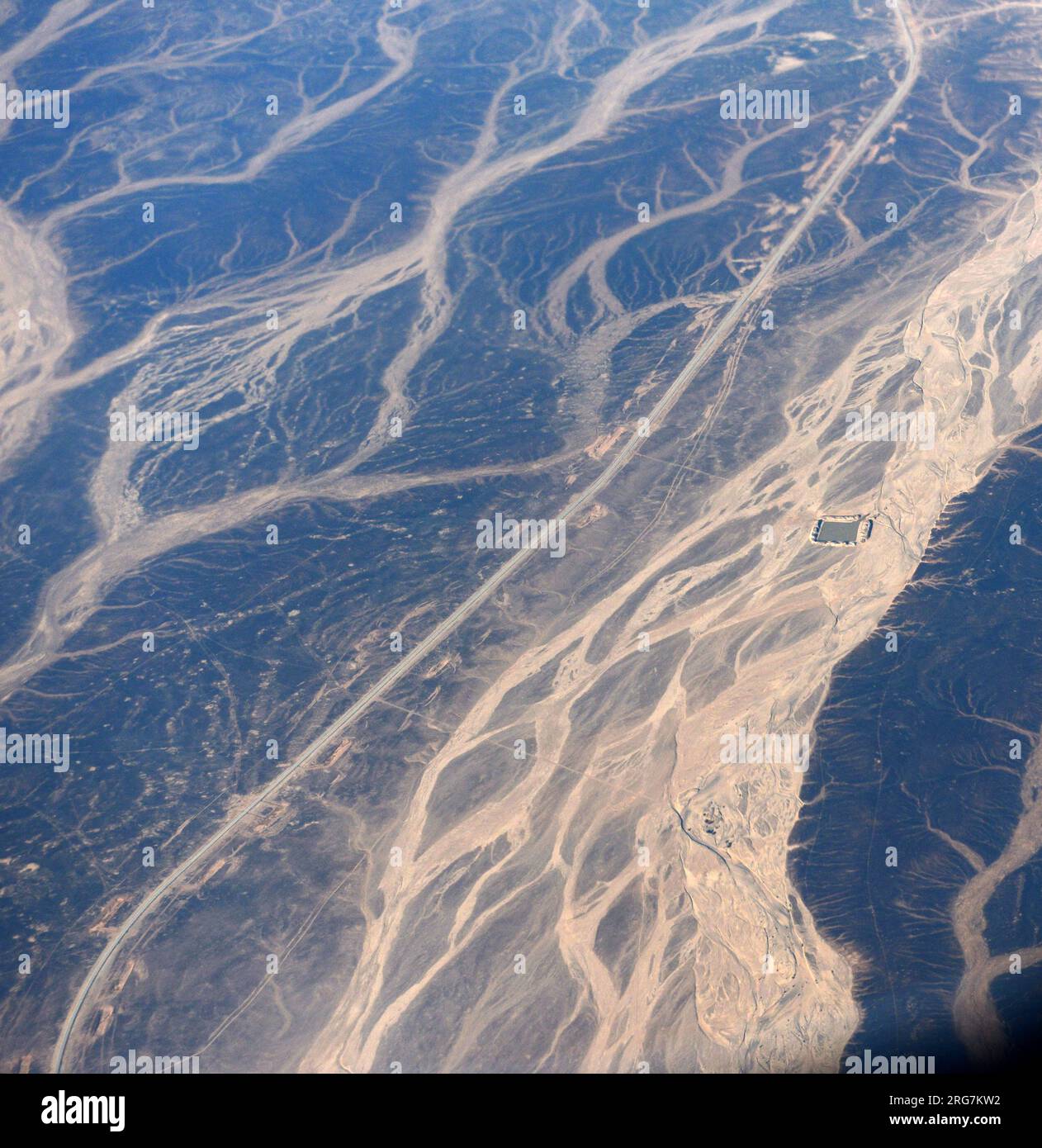A Surreal aerial view of dried river beds in the desert in Jordan near the border with Saudi Arabia. Stock Photo