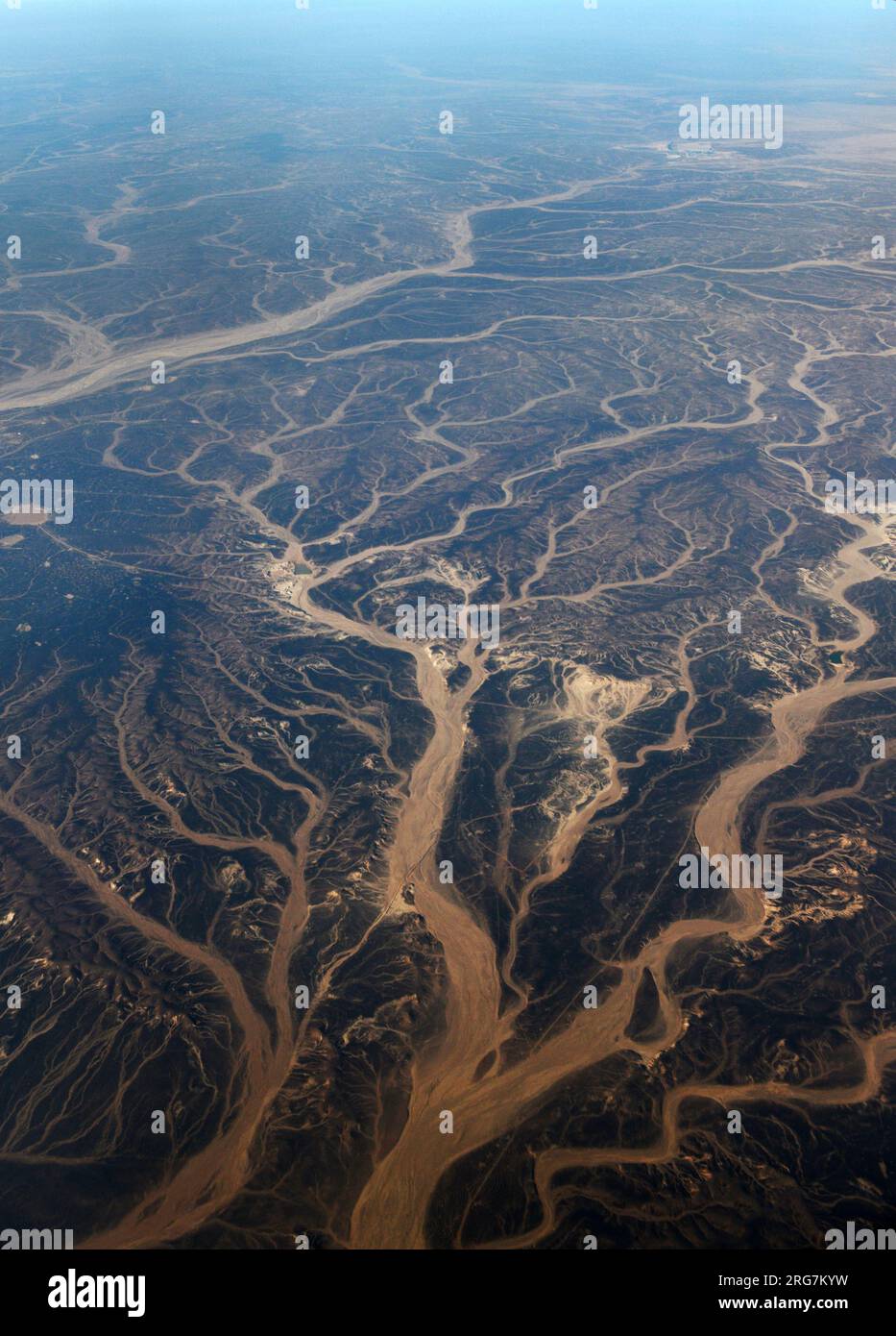 A Surreal aerial view of dried river beds in the desert in Jordan near