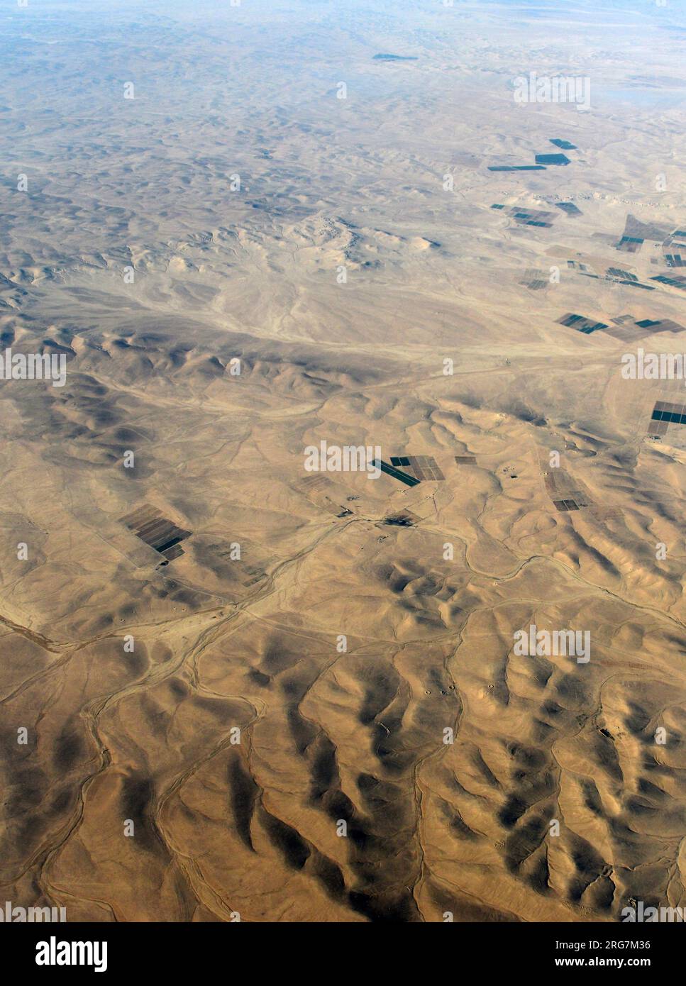 Aerial view of the Eastern Desert with agriculture farms in it. Jordan. Stock Photo