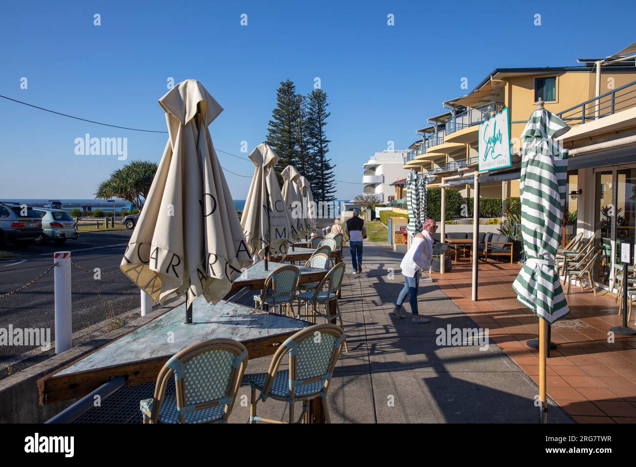 Yamba town in regional NSW, cafe restaurant with tables and parasols