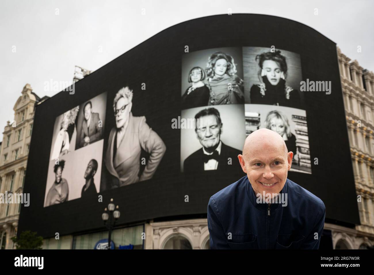 London, UK.  8 August 2023. Photographic artist Ray Burmiston at the launch of ‘Art of London Presents Take A Moment 2023’, his new photography exhibition featuring hundreds of famous faces with their eyes closed for mental health awareness.  Faces, including Eddie Izzard, Helena Bonham Carter and Michael Palin, are seen on the big screens at Piccadilly Circus, ahead of an exhibition in the National Portrait Gallery in September.  Credit: Stephen Chung / Alamy Live News Stock Photo