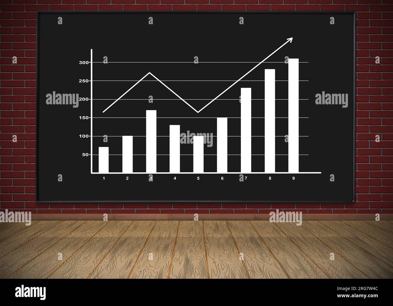 blackboard with drawing chart hanging on red brick wall Stock Photo
