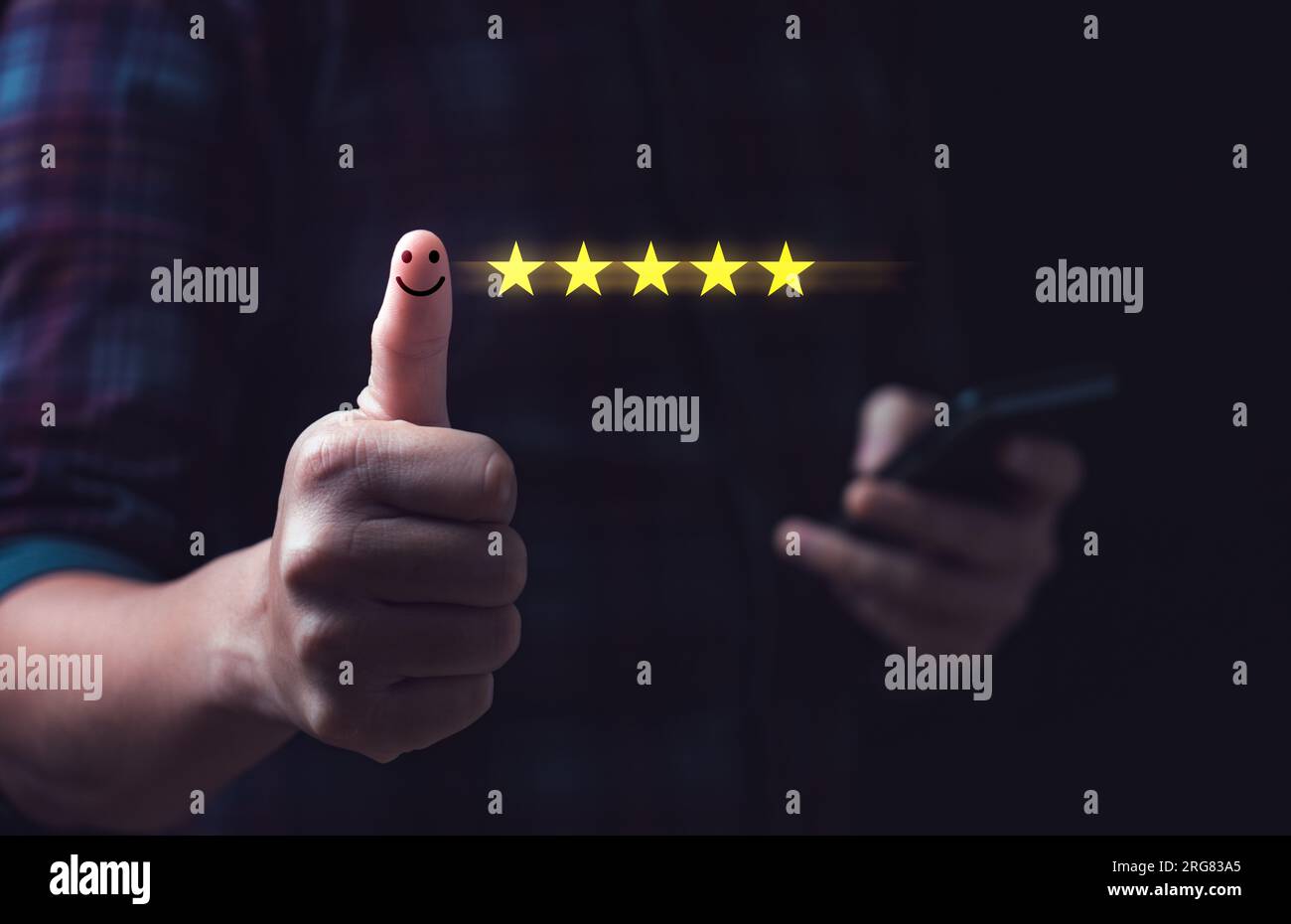 Customer satisfaction concept. Hand with thumb up Positive emotion smiley face icon and five star with copy space. 5 star satisfaction, Excellent busi Stock Photo