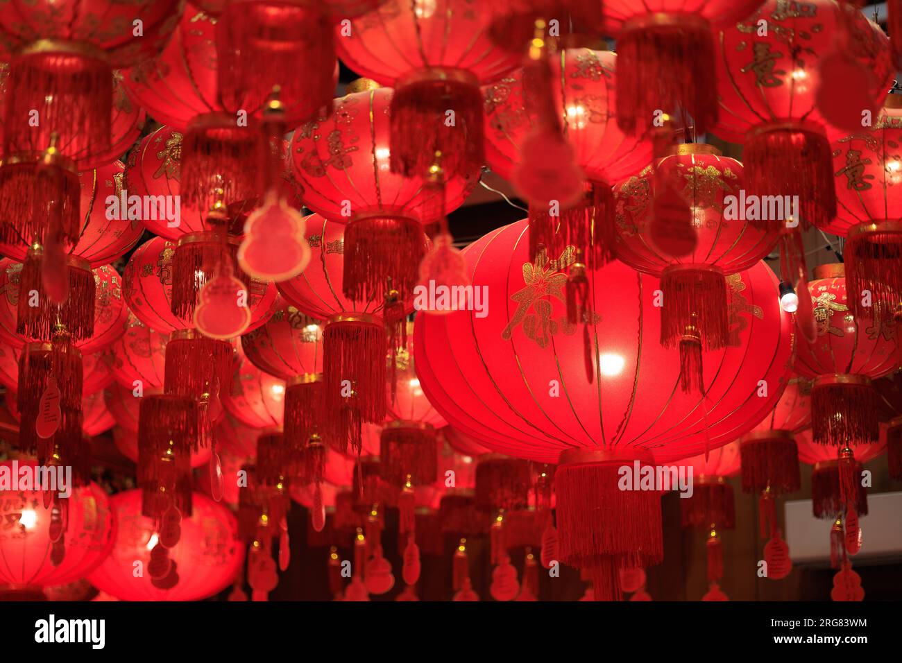 Red Chinese lanterns in Chinatown temple, Bangkok. Stock Photo