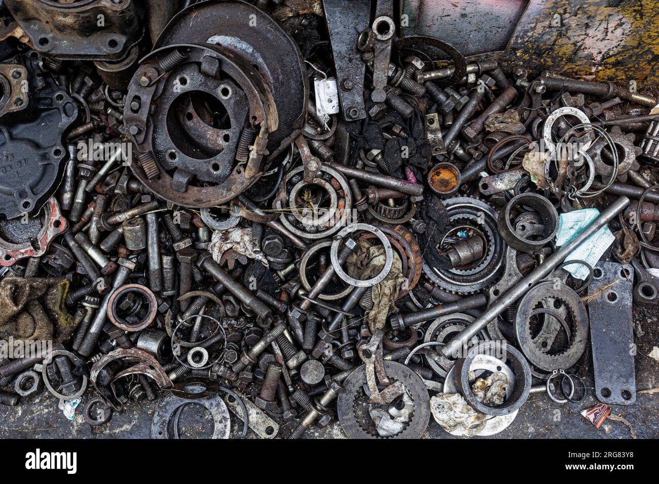 Tons of mechanic parts in a Bangkok Chinatown workshop. Stock Photo