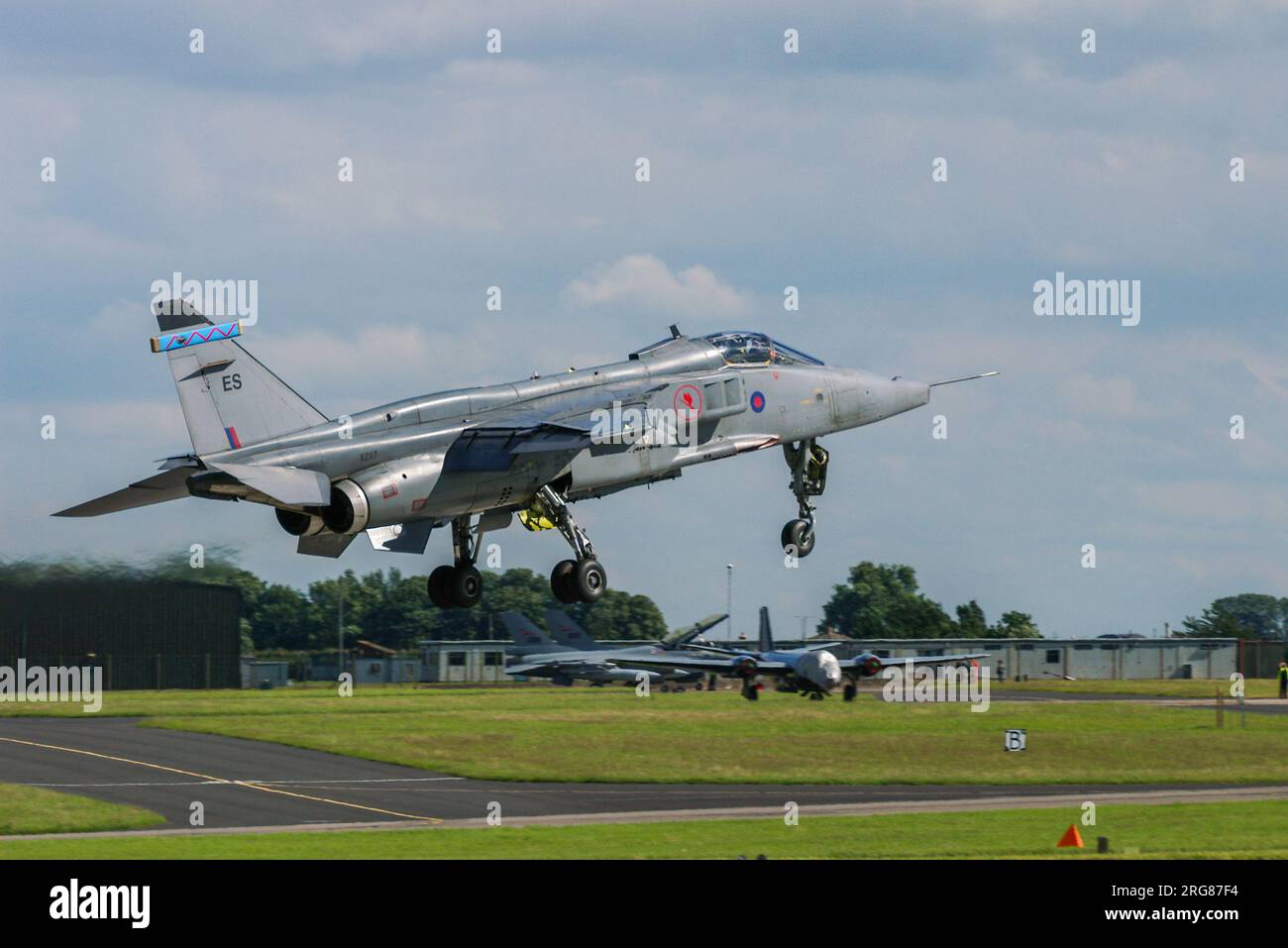 Sepecat Jaguar GR3A fighter jet plane XZ117 landing at RAF Waddington for the International Airshow, UK. Operated by QinetiQ, in 6 Squadron colours Stock Photo