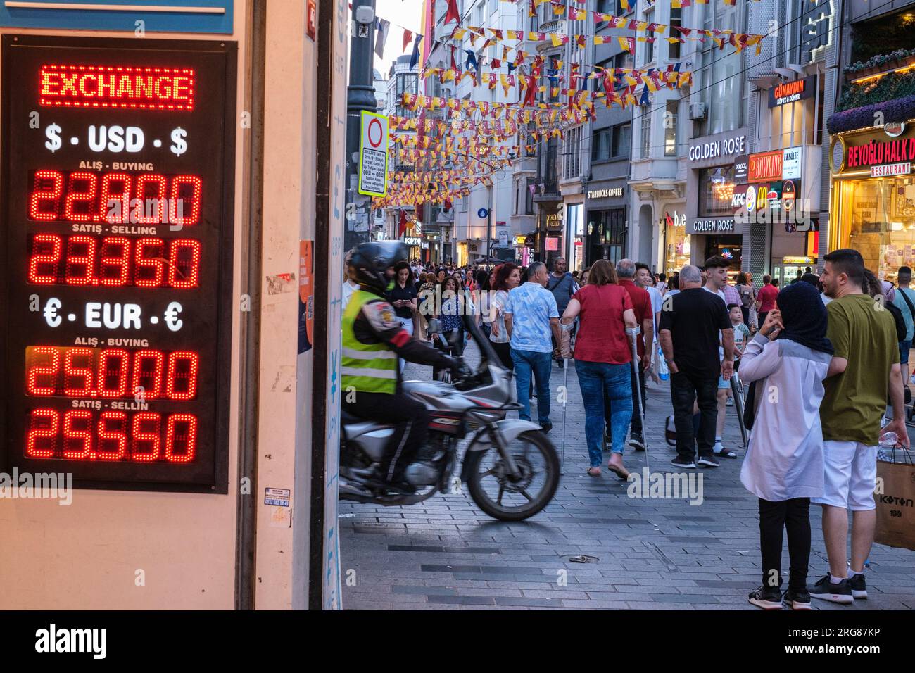 Istanbul, Turkey, Türkiye. Istiklal Street Scene, Currency Exchange Rate on Left. Stock Photo