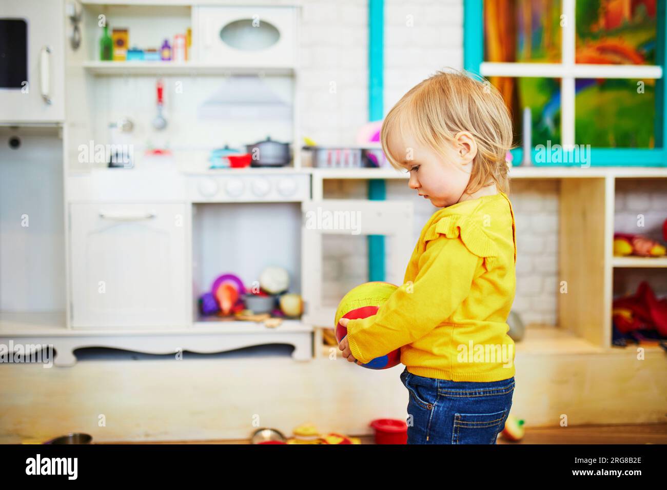 adorable-little-girl-in-kindergarten-daycare-or-preschool-toddler
