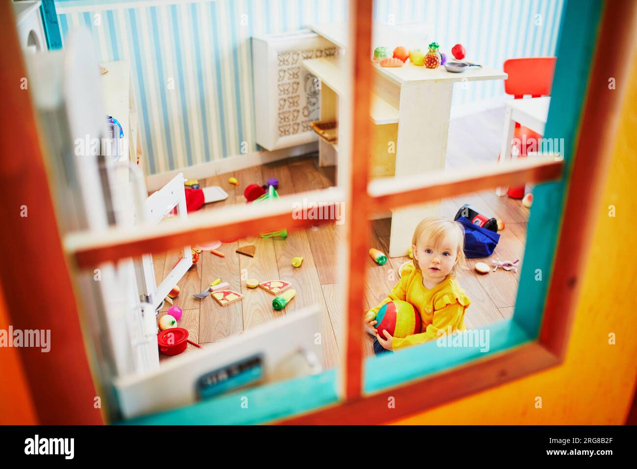adorable-little-girl-in-kindergarten-daycare-or-preschool-toddler