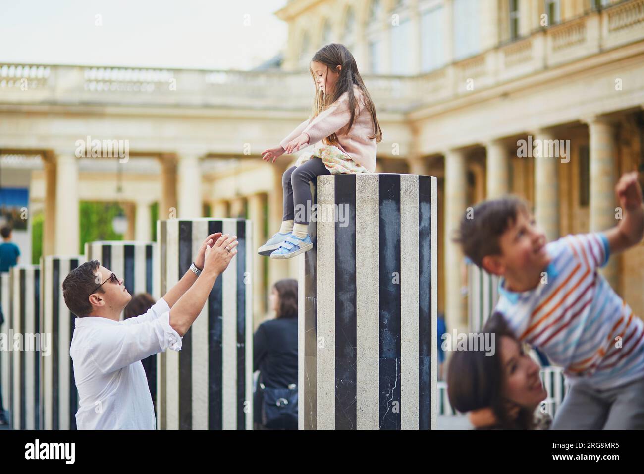 Happy family of four enjoying their trip to Paris, France. Mother ...