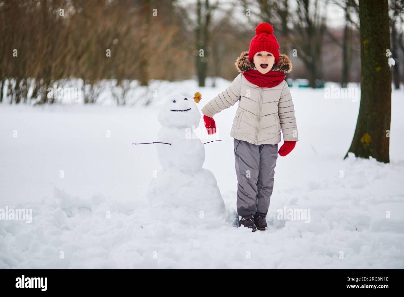 Kids blizzard snowstorm hi-res stock photography and images