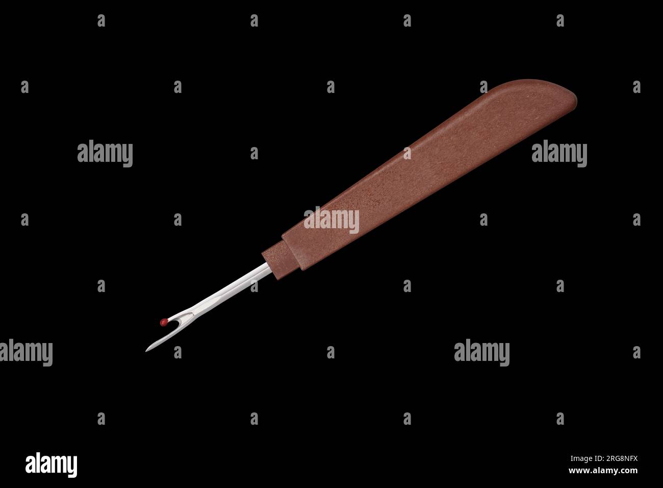 Seam ripper with brown plastic handle on black background Stock Photo ...