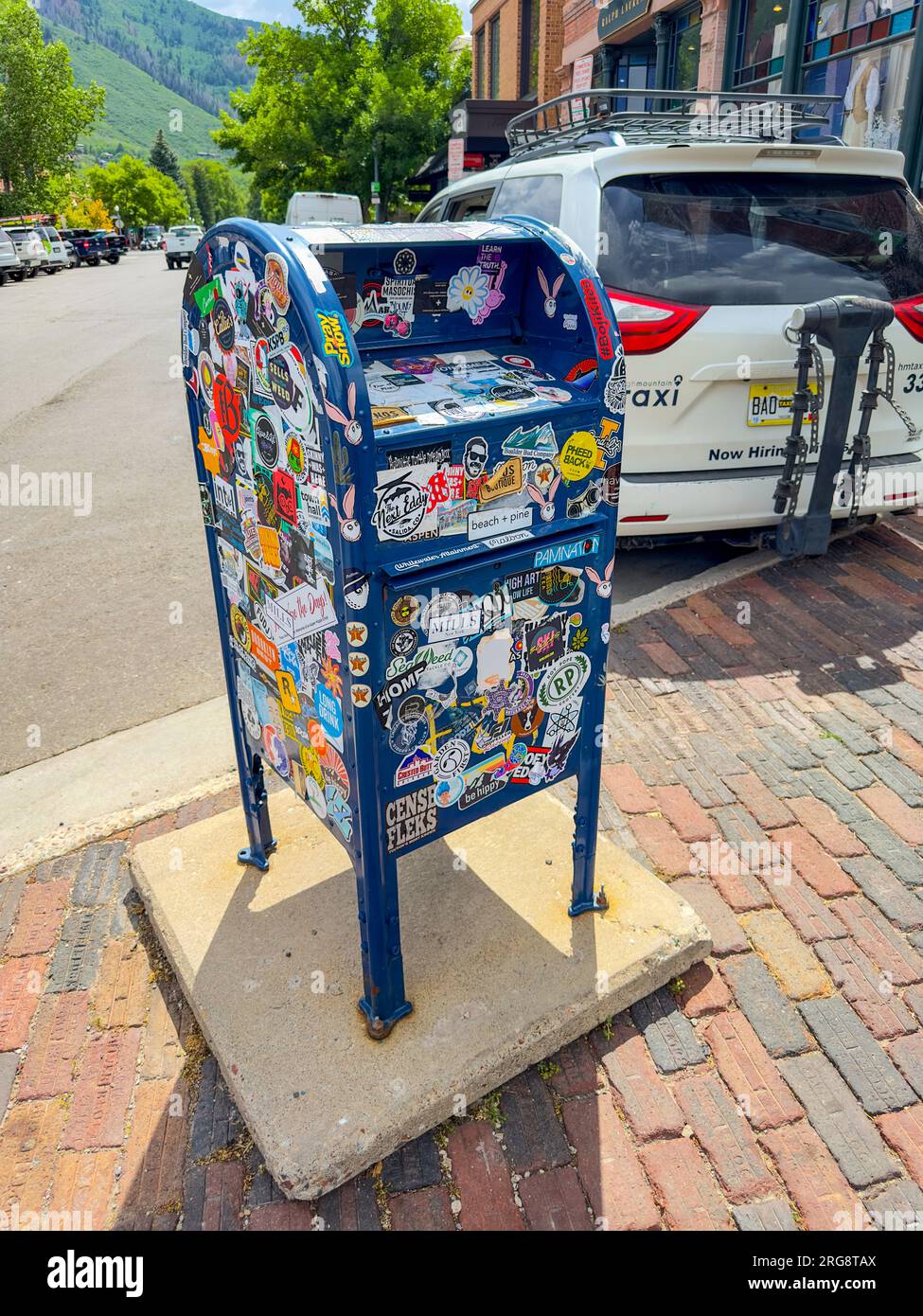 Aspen, CO, USA July 27, 2023 USPS mailbox with stickers all over