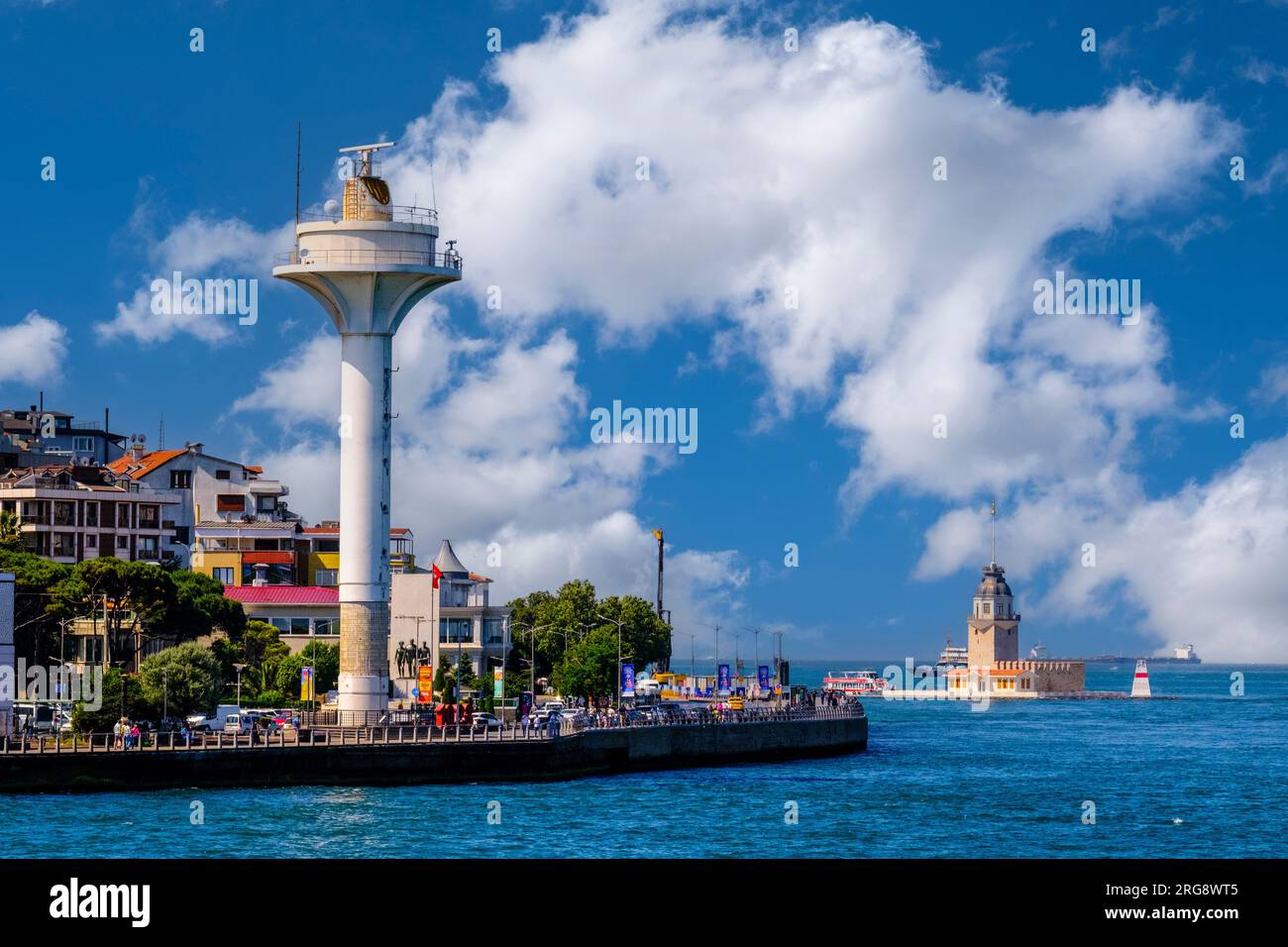 Istanbul, Turkey, Türkiye. Uskudar Control Tower to Regulate Ship Traffic Passing through the Bosphorus. Maiden's Tower (Kiz Kulesi) in background. Stock Photo