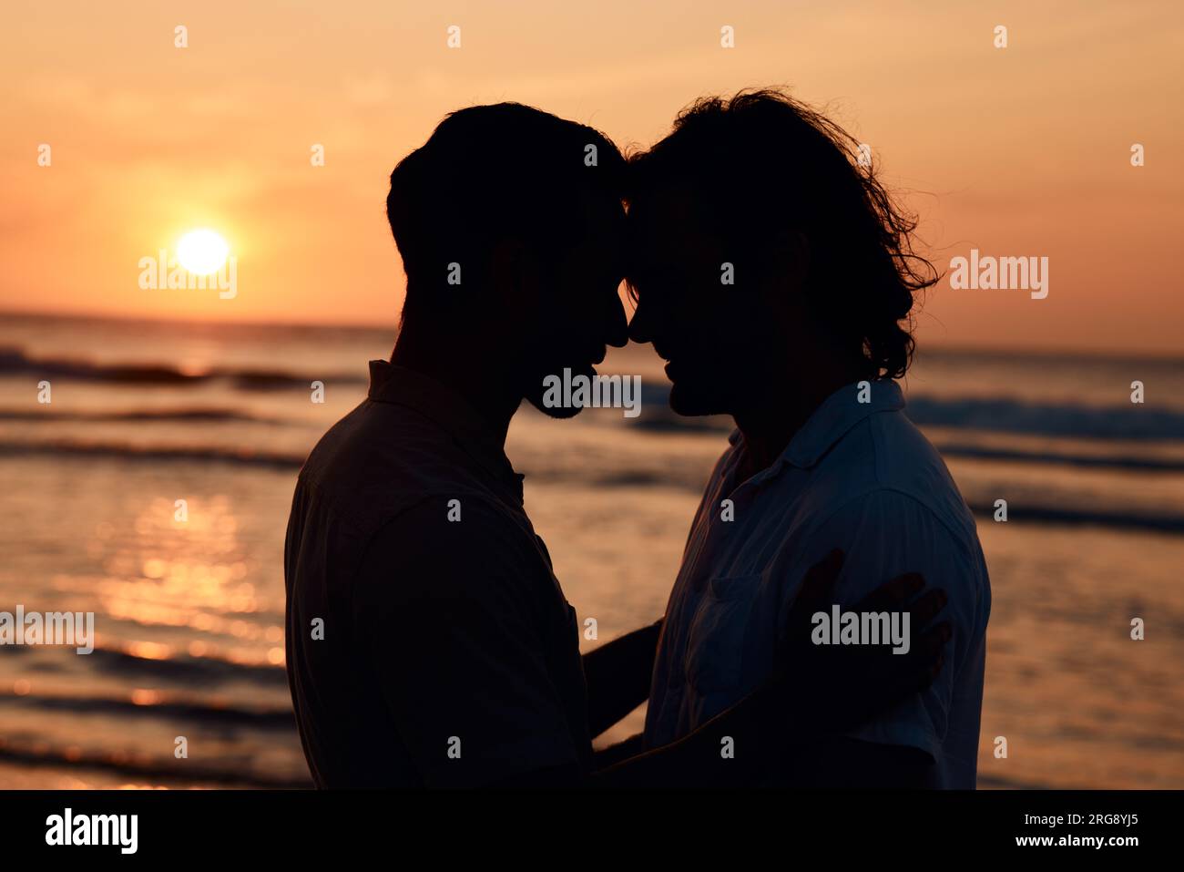 Silhouette, kiss and gay couple on beach, sunset and love on summer island  vacation together in Thailand. Sunshine, ocean and romance, lgbt men in  Stock Photo - Alamy