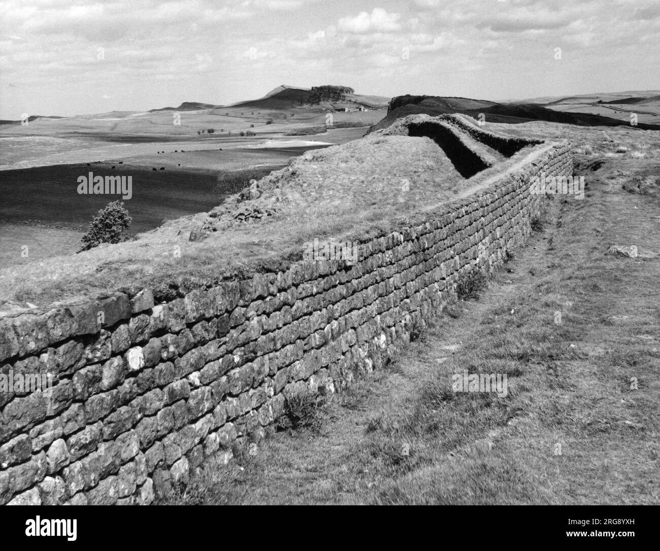 Close-up view of a well-preserved section of Hadrian's Wall, near Peel Crag. This part of the wall is particularly popular with walkers. Stock Photo