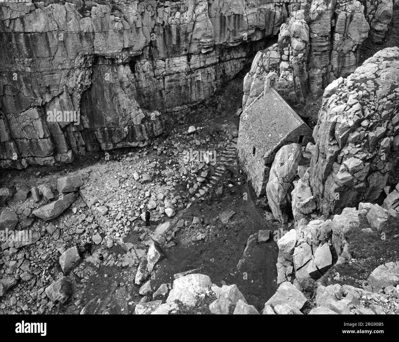 Rocks on head Black and White Stock Photos & Images - Alamy