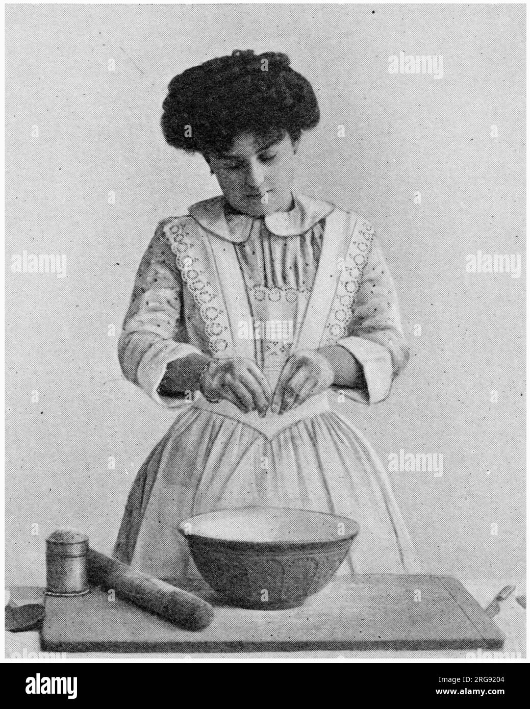 Cooking pie together Black and White Stock Photos &amp; Images - Alamy