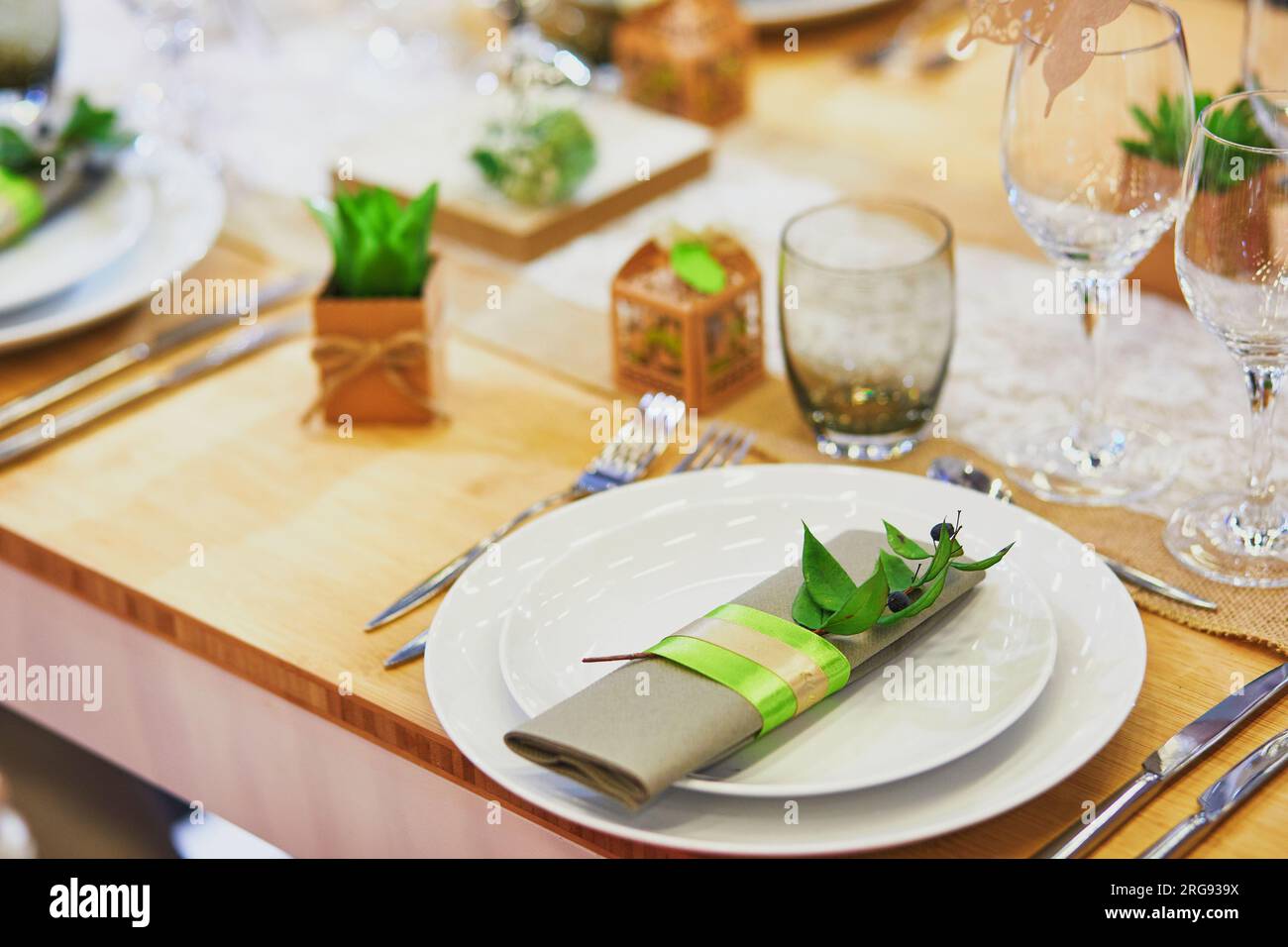 Beautiful table set with candles and flowers for a festive event, party ...
