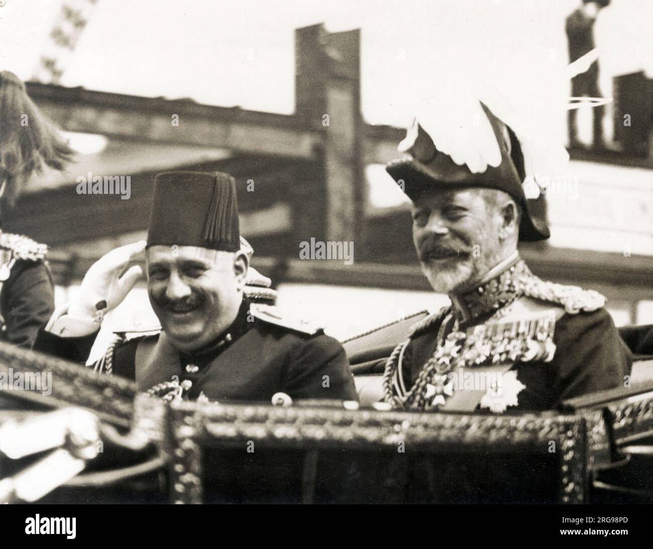 King Fuad of Egypt's Official 3-week visit to Great Britain - with King George V in an open carriage on their way from Victoria Station to Buckingham Palace, London on 4 July 1927 Stock Photo