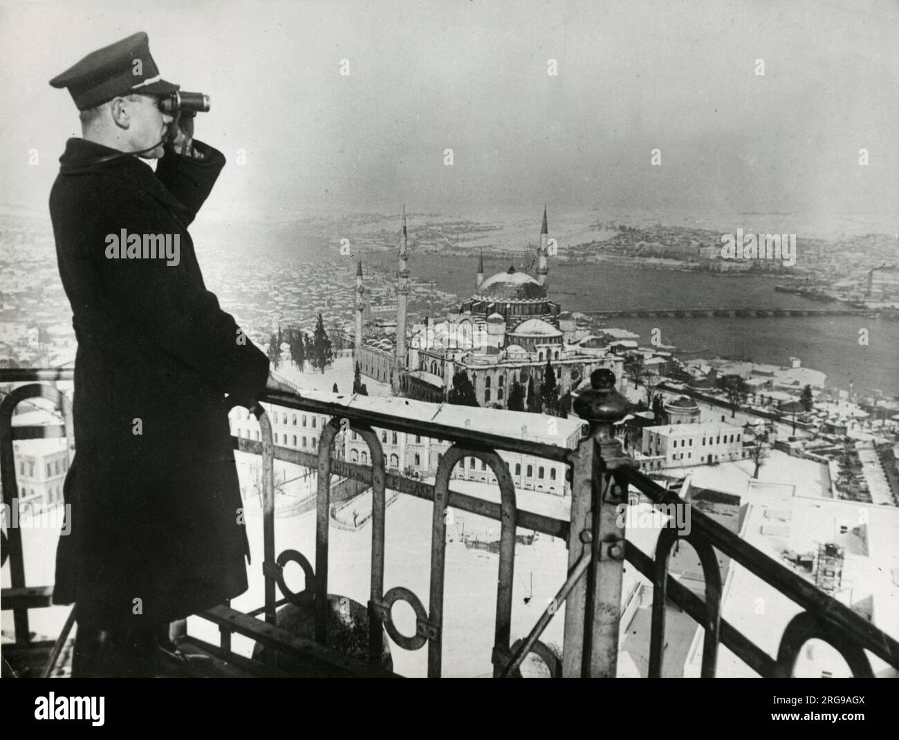 Istanbul Modern Fire Department, Turkey - High above the snow-covered city, a member of the Fire Brigade keeps watch day and night for possible fires.Keeping watch Stock Photo