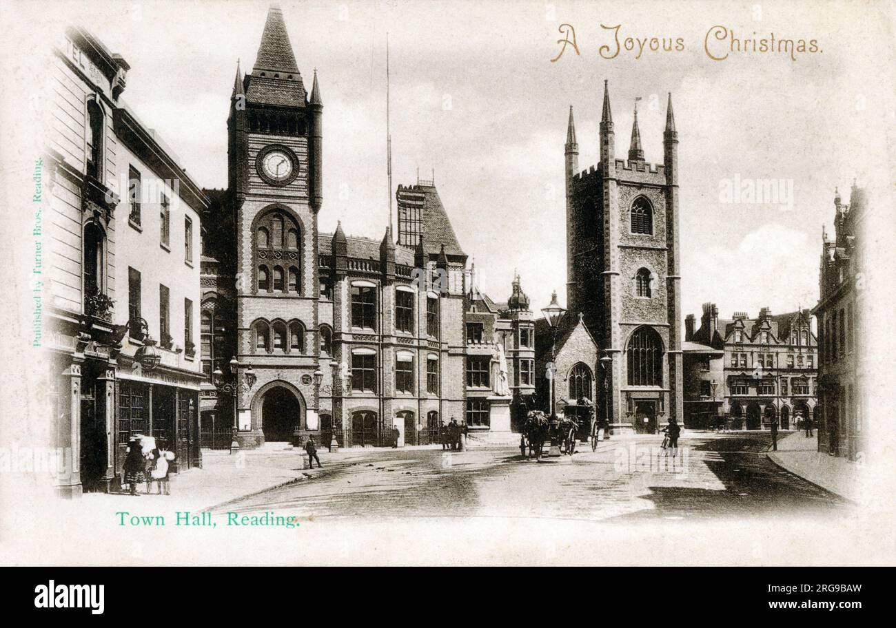 The Town Hall, Reading, Berkshire - with the Statue of Queen Victoria and St. Laurence's Church. Stock Photo