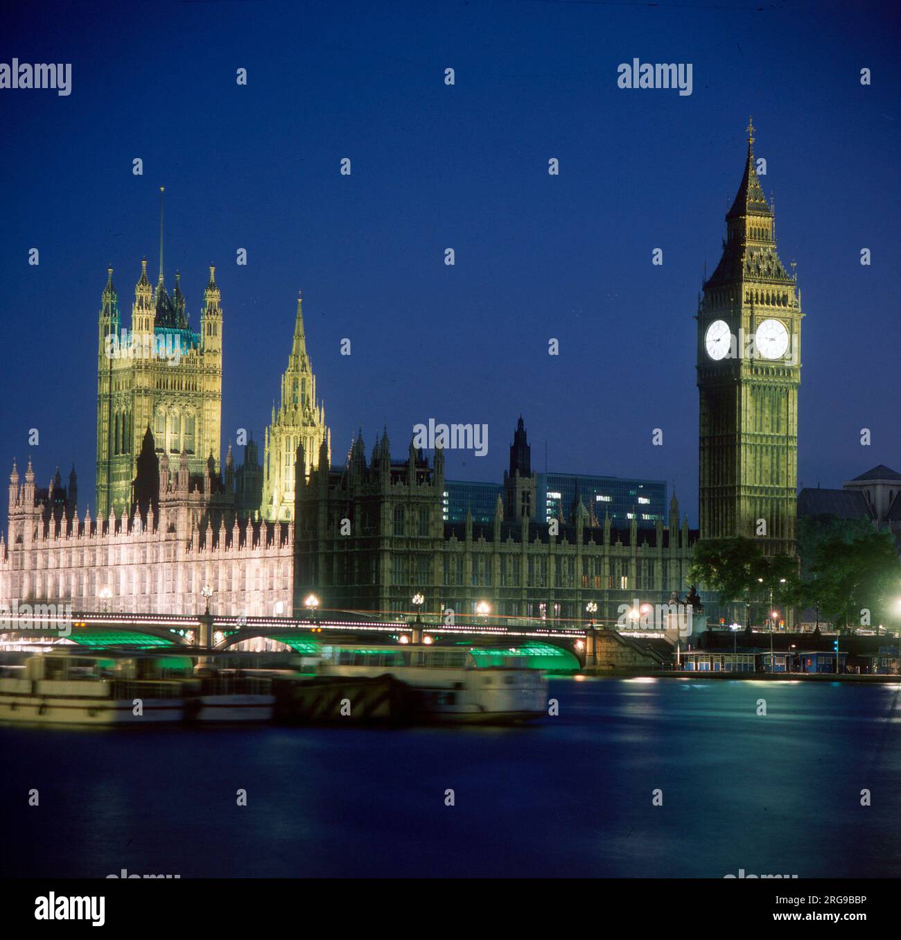The Houses of Parliament, Westminster Bridge over the River Thames and Big Ben at Night Stock Photo