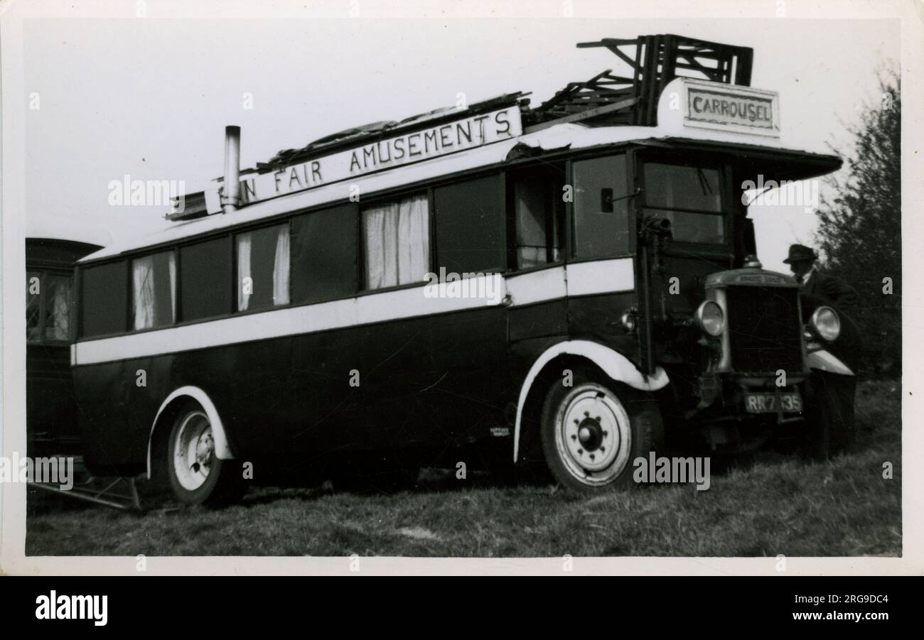 Associated Daimler Fun Fair Vintage Bus & Caravan, England. Stock Photo