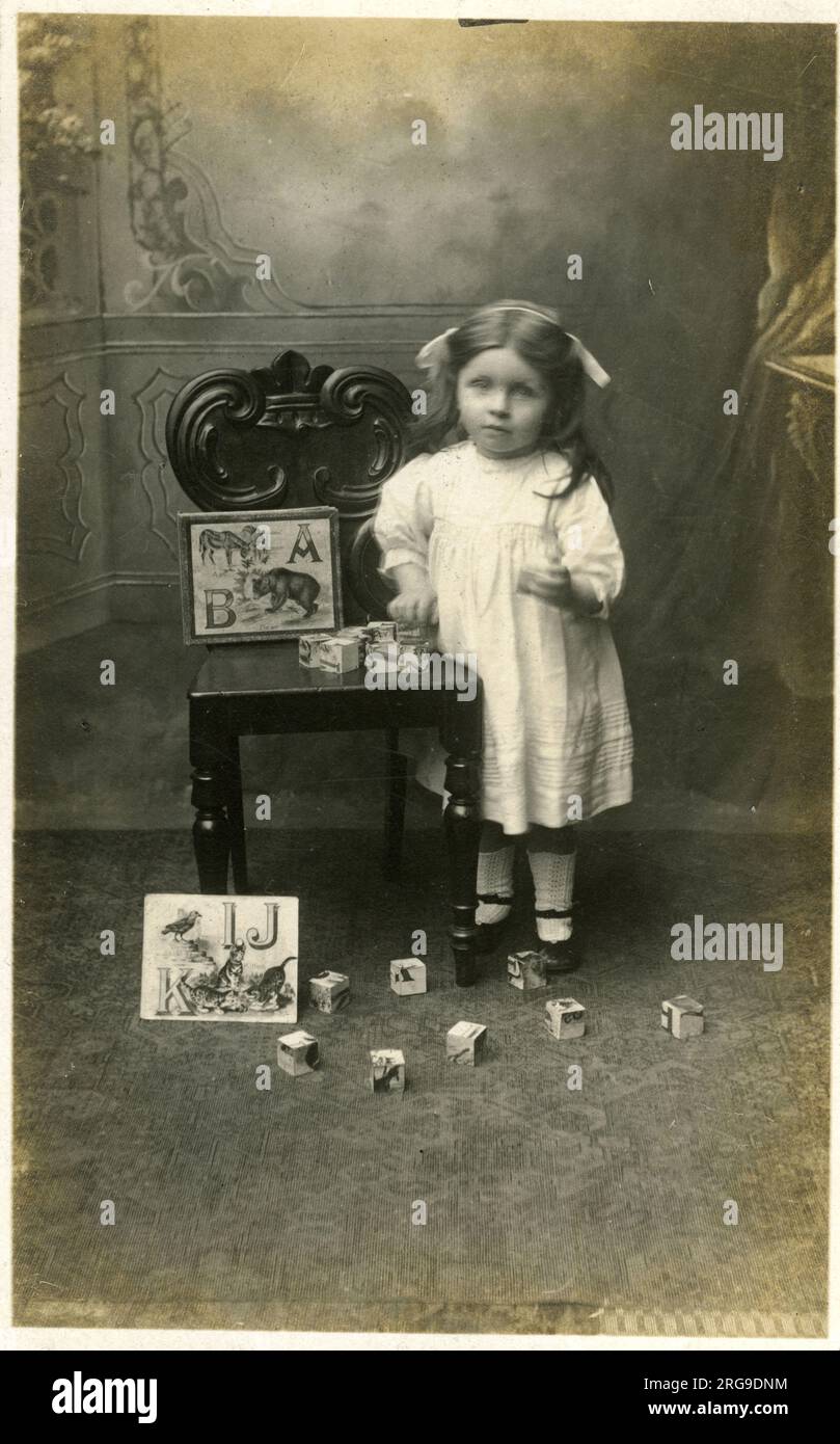 Edwardian Child with Toy Bricks, Whitby Photographer 'Ross'England. Stock Photo